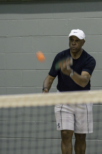 Man playing Pickleball